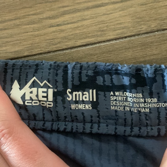 REI brand hiking shorts. Blue, Small, button close. - Picture 2 of 7